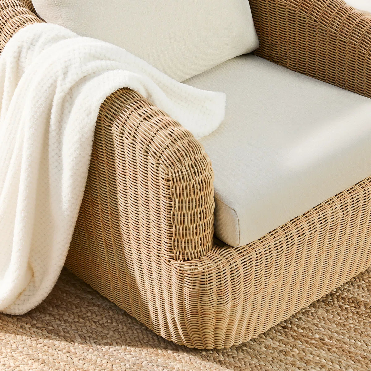 Costa™ | Silla lounge exterior giratoria con estructura de ratán